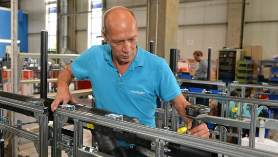 Man working at a prefabrication facility Man working at a prefabrication facility