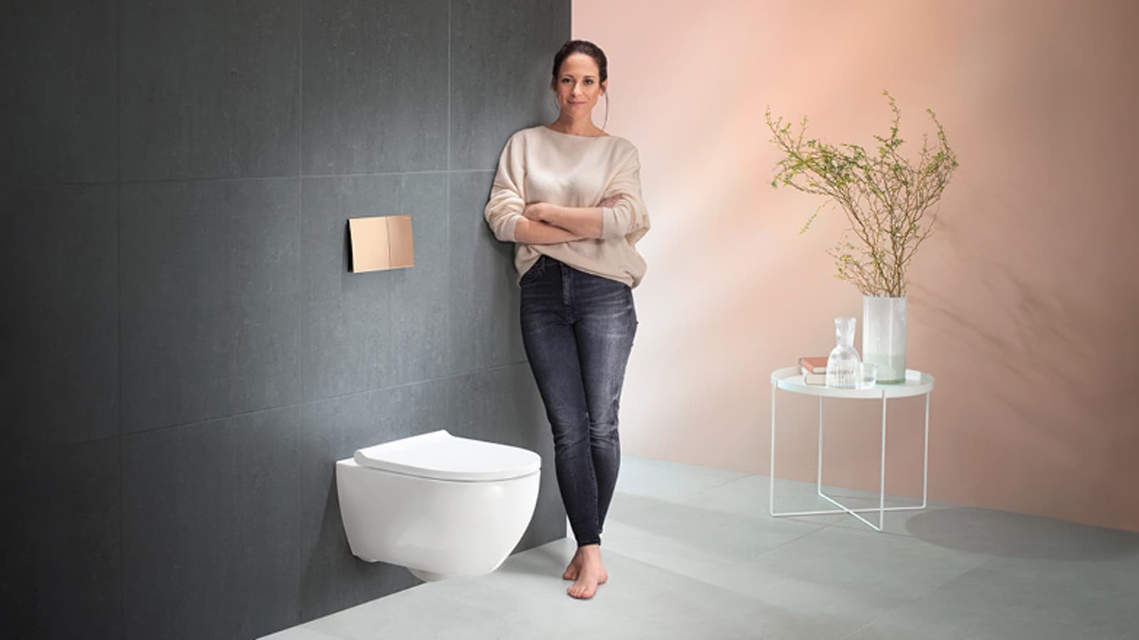 Woman next to her Geberit Acanto toilet Woman next to her Geberit Acanto toilet